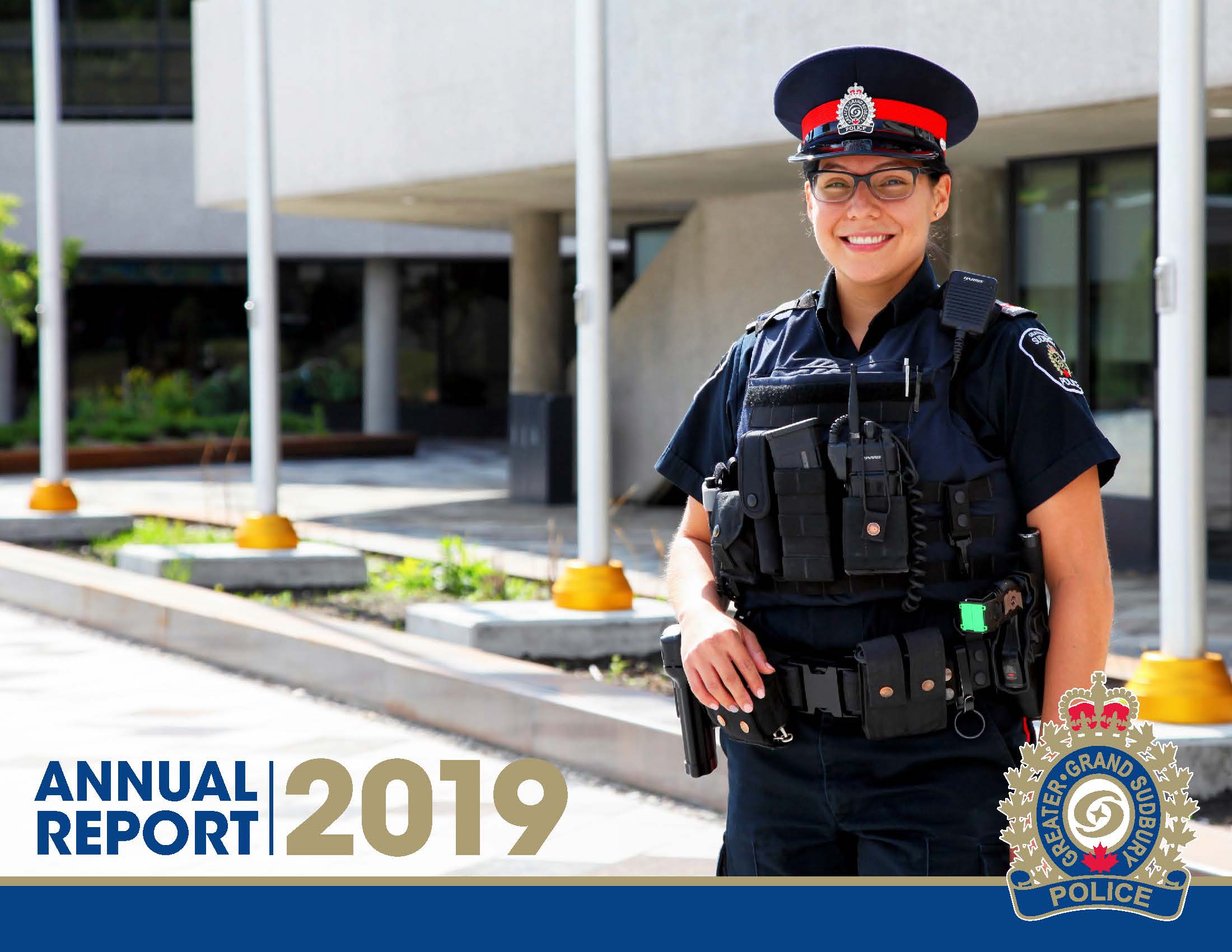 Woman police officer standing smiling