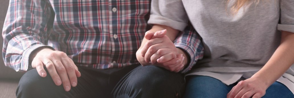 two people holding hands