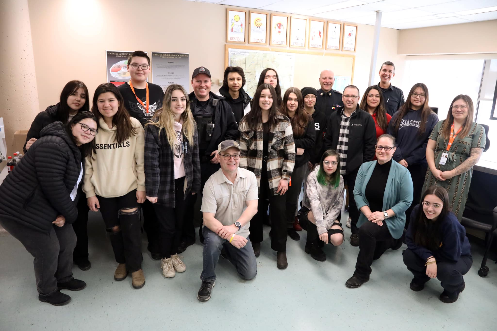 group of students and police officers