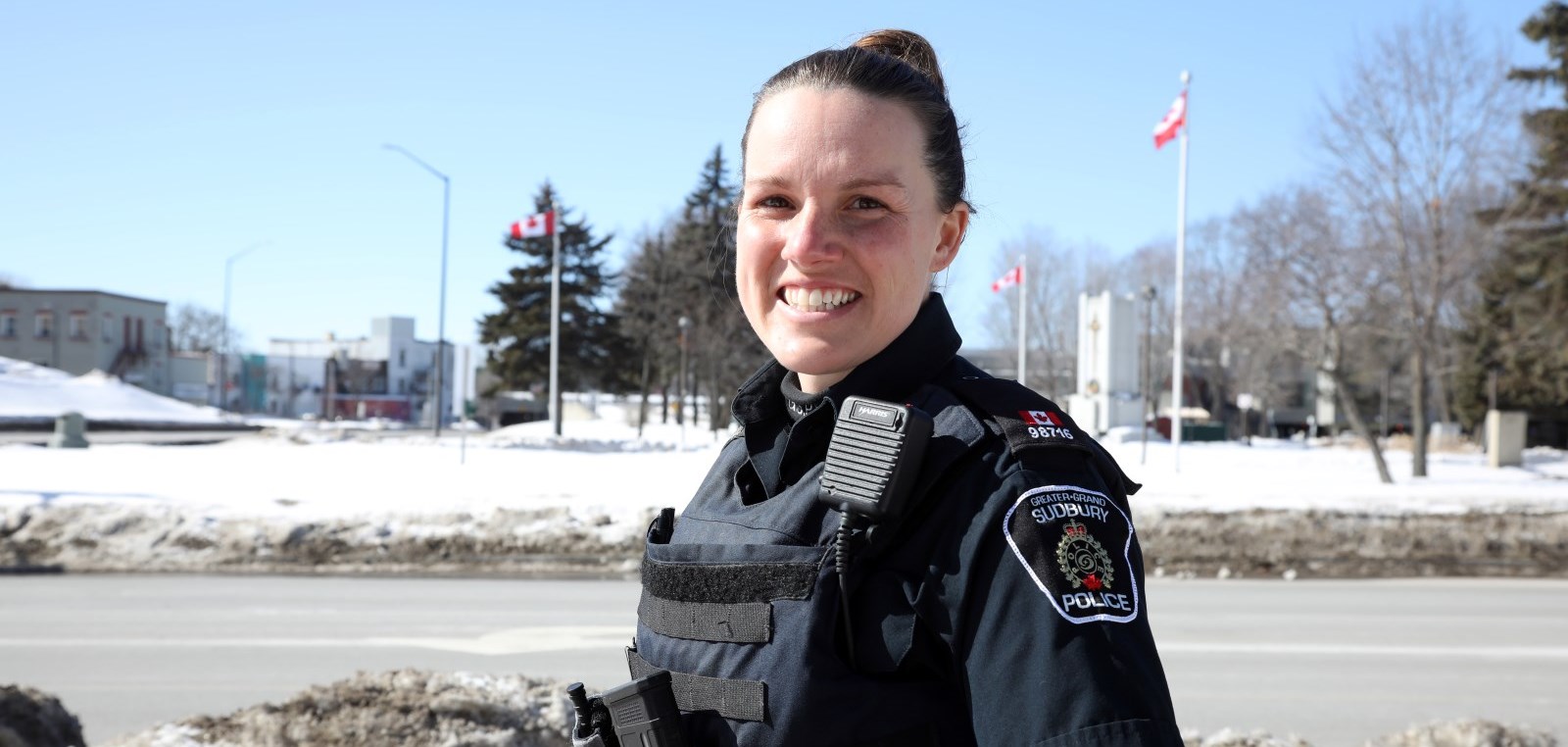 female Officer standing outside smiling