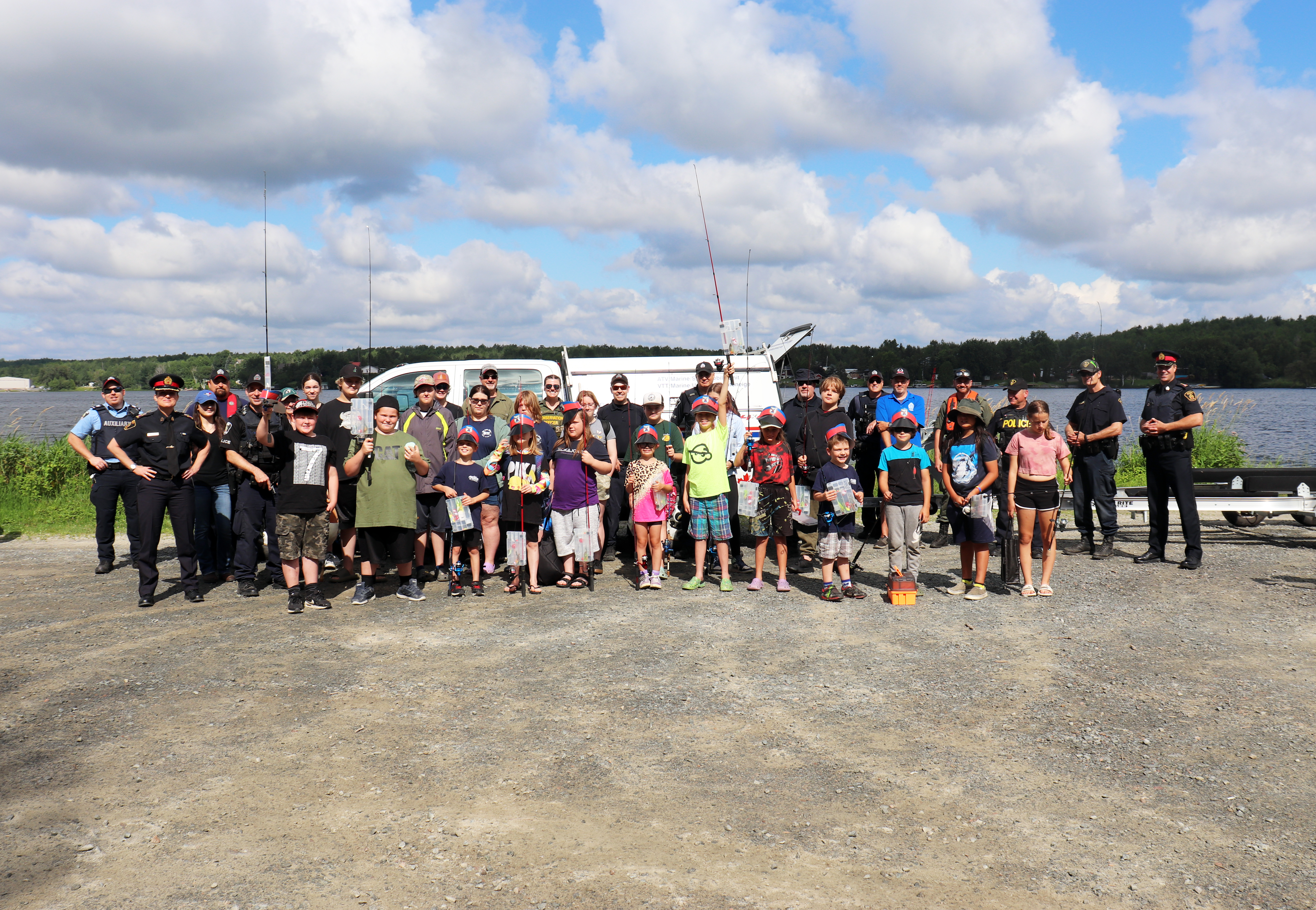 group of officers and kids outside 
