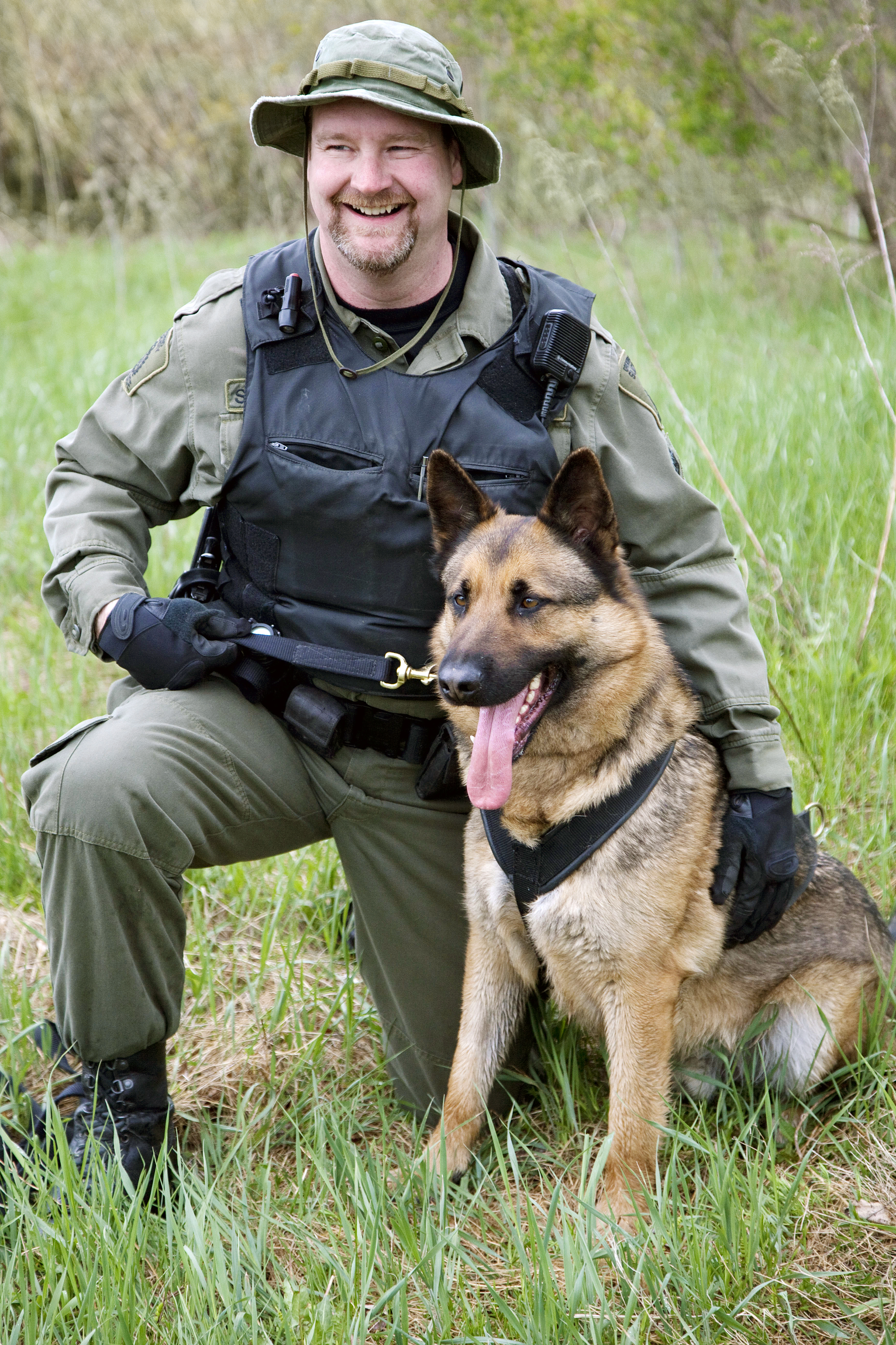 police officer and police dog outside
