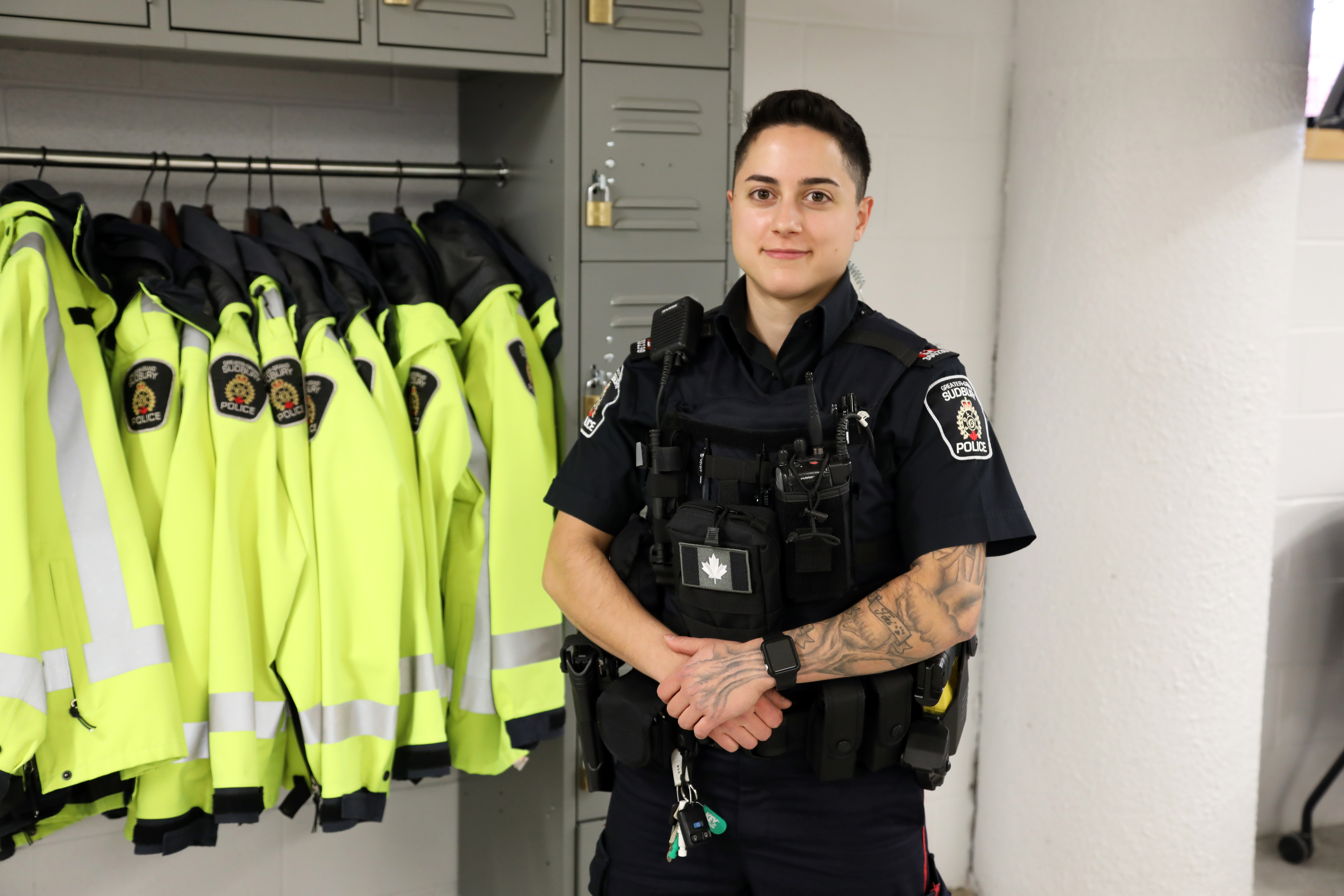 Police officer standing and smiling