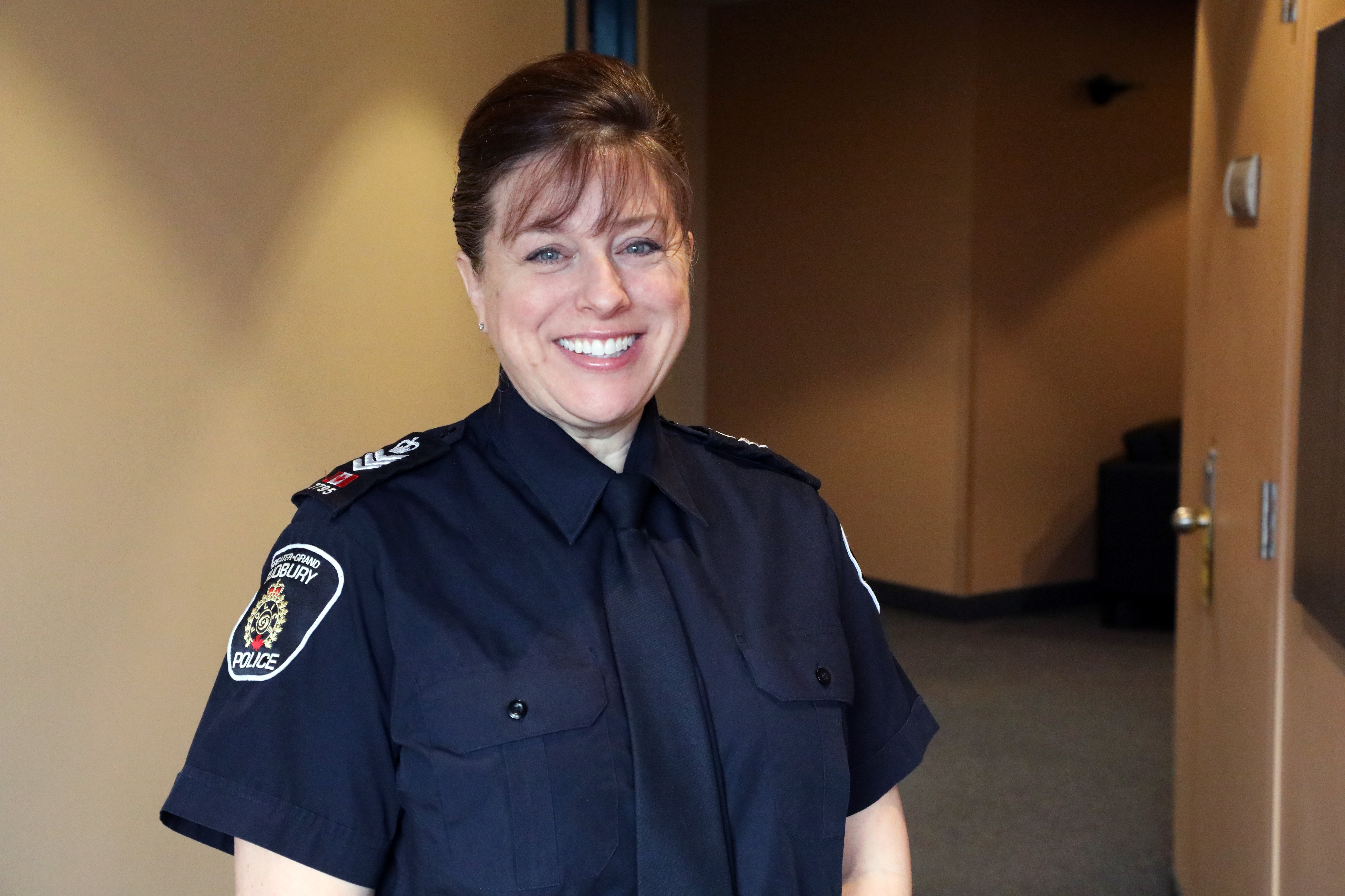 police woman smiling