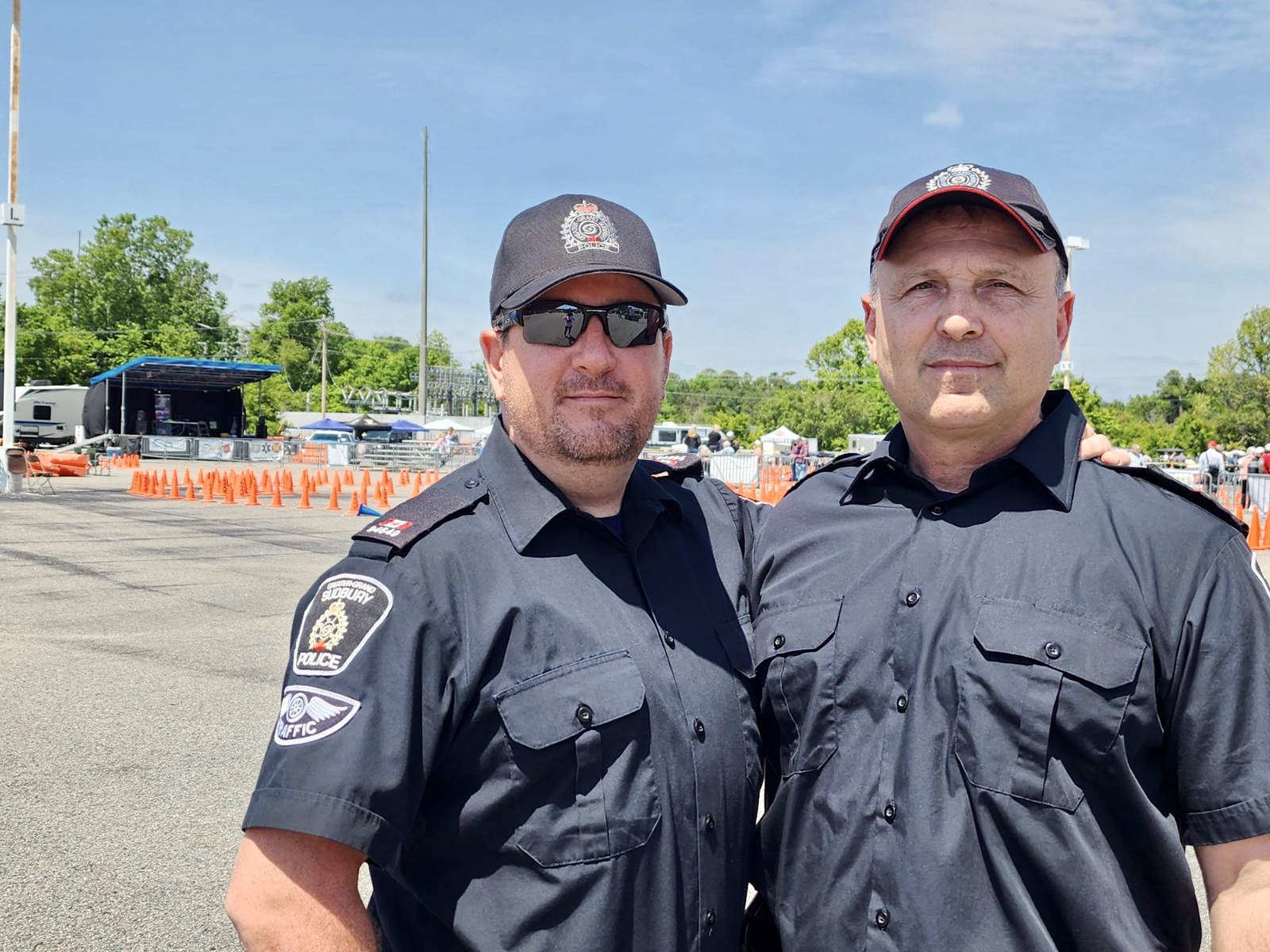 two police officers smiling